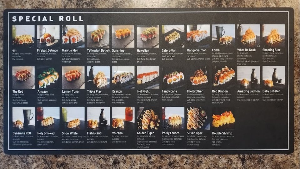 Printed sushi menu with category headings.